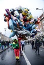 A man hold many balloons on St. Patrick`s Day ParadeÃÂ in Dublin, Ireland, March 18th 2015